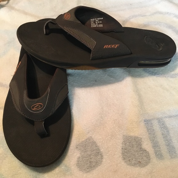 flip flops with can opener on bottom